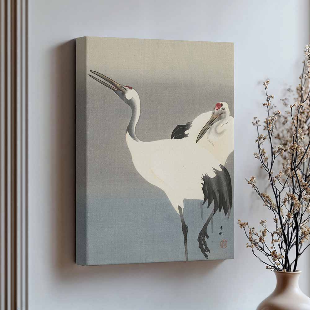 Ohara Koson was een Japanse Kunstenaar. Op deze canvas in baklijst is de print 'Two Cranes' te zien. Twee kraanvogels. Grote kunst voor in jouw interieur. 